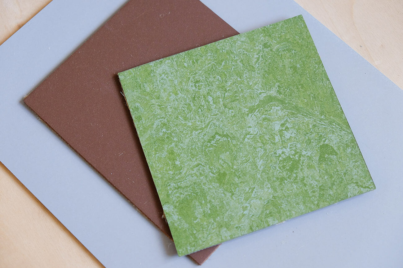 Différents types de linoléum : gris, marron & lino de sol